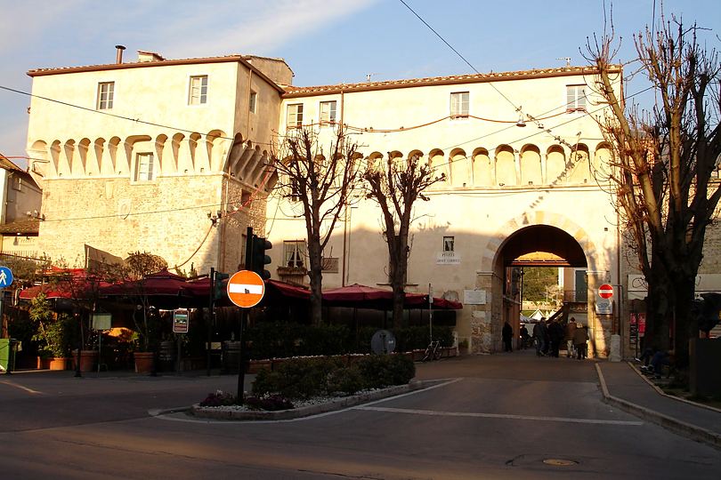 Pietrasanta, a town gate at sunset